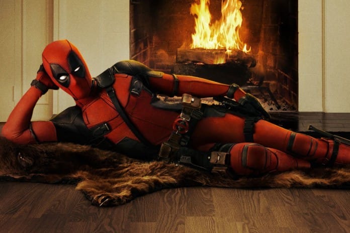 Deadpool laying by the Fire