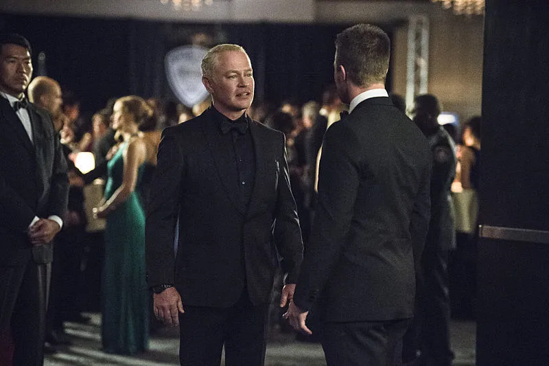 Damien Darhk and Oliver Queen talk (risky) business in Arrow Episode 7
